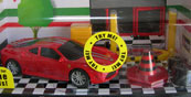 Ferrari 430 Scuderia in  Garage Diorama with Light & Sound, scale 1:43 in Red  by Bburago