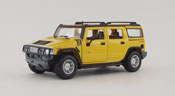 Hummer H2 SUV 2003, scale 1:27 in Yellow by Maisto, diecast scale model car