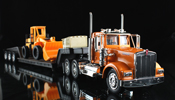 Kenworth W900 Lowboy 1979 with Construction Tractor, scale 1:32 in Orange by NewRay, diecast miniature scale model truck.